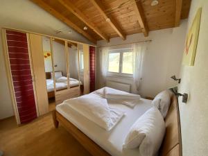 Кровать или кровати в номере Ferienwohnung Mark-Oehmen