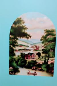 a picture of a painting of a house and a river at Nur home1 Abuzer Yegin in Istanbul