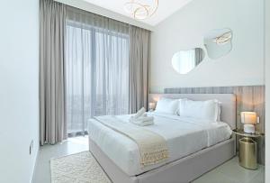 Postel nebo postele na pokoji v ubytování Downtown Flat Burj Khalifaoperametro-sleeps 3!