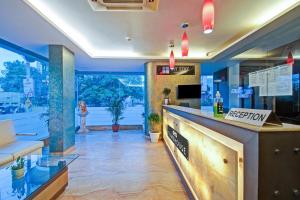 a hotel lobby with a reception counter and a view at Collection O Hotel My Stay Inn II in Jaipur