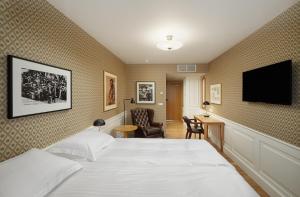 Łóżko lub łóżka w pokoju w obiekcie Reykjavik Natura - Berjaya Iceland Hotels