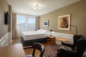 Łóżko lub łóżka w pokoju w obiekcie Reykjavik Natura - Berjaya Iceland Hotels