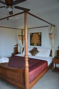 เตียงในห้องที่ Nirvana Guesthouse & Hostel