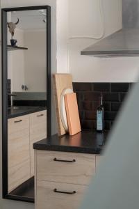 Η κουζίνα ή μικρή κουζίνα στο The Brewer apartments by Daniel&Jacob's +38 φωτογραφίες