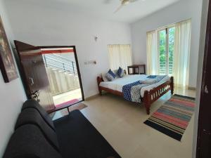 Postel nebo postele na pokoji v ubytování Red Stone Villas