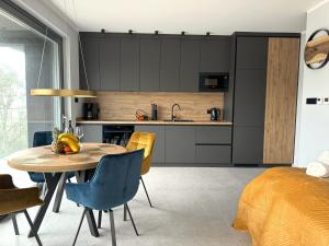 Η κουζίνα ή μικρή κουζίνα στο Apartament Błękitny Horyzont-Sea View Hevenia +14 φωτογραφίες