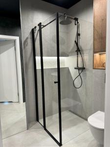 Ένα μπάνιο στο Apartament Błękitny Horyzont-Sea View Hevenia