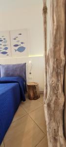 Postel nebo postele na pokoji v ubytování Casa Pomonte + 15 fotografií