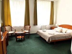 Broadway City Guesthouse客房内的一张或多张床位