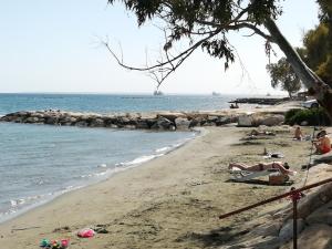a group of people laying on the beach at GALATEX BEACH STUDIO in Limassol