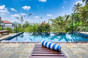 a swimming pool in a villa with a view at Amandara Hills Kandy in Kandy