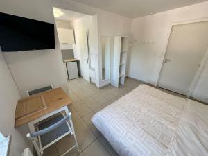 Ένα ή περισσότερα κρεβάτια σε δωμάτιο στο #Herbie1 - Studio Mulhouse - Charme & Confort