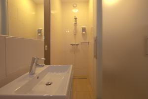 
Een badkamer bij Hampshire Boshotel - Overberg
