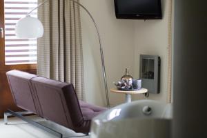 TV a/nebo společenská místnost v ubytování Boshotel Overberg