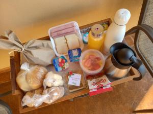 a drawer with some food on a table at Pousada Caminho da Serra in São Roque de Minas