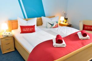 Posteľ alebo postele v izbe v ubytovaní Hotel Zum Mühlental