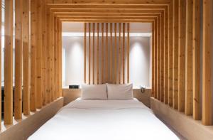 Postel nebo postele na pokoji v ubytování HOTEL MYEONG JAK + 37 fotografií