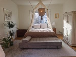 Un pat sau paturi într-o cameră la Haha
