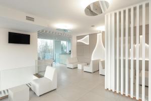 TV a/nebo společenská místnost v ubytování Tempus Hotel & Spa