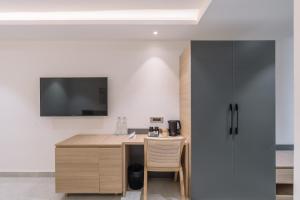 Kuchyň nebo kuchyňský kout v ubytování SKYLA Studios & Suites - Kondapur