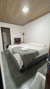 Postel nebo postele na pokoji v ubytování Pousada Girassol