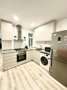 Η κουζίνα ή μικρή κουζίνα στο Apartamento Lauda