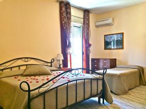 Postel nebo postele na pokoji v ubytování Park Hotel Paradiso