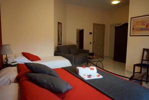 Postel nebo postele na pokoji v ubytování Park Hotel Paradiso