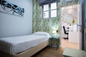 Giường trong phòng chung tại Hostal San Francisco