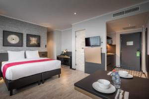 Postel nebo postele na pokoji v ubytování Hotel Jamingo