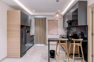 Kuchyň nebo kuchyňský kout v ubytování SKYLA Studios & Suites - Kondapur