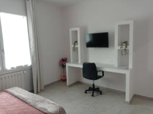 Televisyen dan/atau pusat hiburan di B&B infinity +4 gambar
