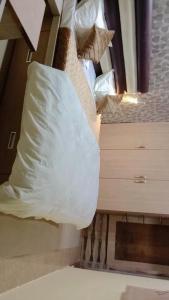 Cama o camas de una habitación en LAVISH VILLA