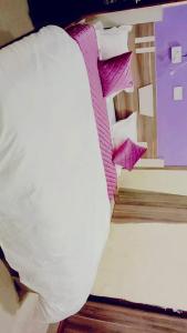Cama o camas de una habitación en LAVISH VILLA
