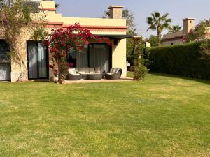 Zahrada ubytování LUXUEUSE VILLA AVEC PISCINE PRIVEE PROCHE D'AGADIR