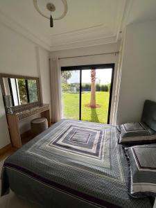 Postel nebo postele na pokoji v ubytování LUXUEUSE VILLA AVEC PISCINE PRIVEE PROCHE D'AGADIR + 23 fotografií