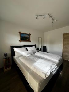Postel nebo postele na pokoji v ubytování Apartment Alpenstyle Ennstal