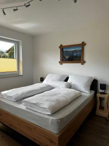 Postel nebo postele na pokoji v ubytování Apartment Alpenstyle Ennstal