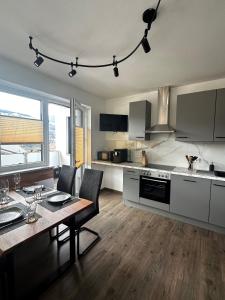 Kuchyň nebo kuchyňský kout v ubytování Apartment Alpenstyle Ennstal
