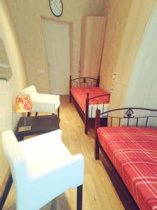 
Кровать или кровати в номере Voskhod
