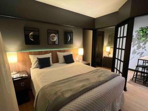 Llit o llits en una habitació de La Residence Paulista - Flat 506 - Residence Service + Academia + Piscina