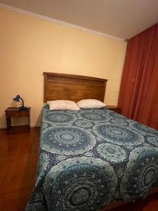 Ένα ή περισσότερα κρεβάτια σε δωμάτιο στο 1 dormitorio Piso bajo