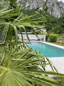 Bazén v ubytování Maison avec vue sur le Vercors nebo v jeho okolí