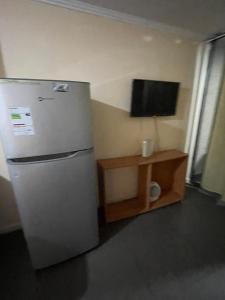 Η κουζίνα ή μικρή κουζίνα στο departamento 1 dormitorio centro norte