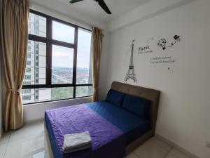 a bedroom with a bed and a window with the eiffel tower at DSummit 3bedroom WiFi Netflix 5 Pax in Johor Bahru +27 photos