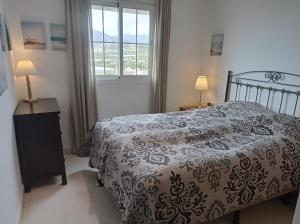 Postel nebo postele na pokoji v ubytování Mirador Penthouse, centro y mar, ático grande