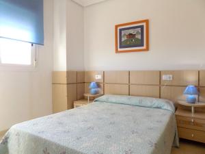 Ένα ή περισσότερα κρεβάτια σε δωμάτιο στο PlayaR83MED011 +19 φωτογραφίες