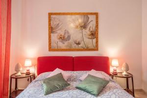 Кровать или кровати в номере Piombino Apartments - Casa Dini