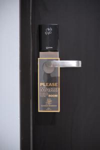 Certifikát, hodnocení, plakát nebo jiný dokument vystavený v ubytování Gold Hotel Simpang Lima