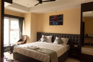 Postel nebo postele na pokoji v ubytování HOTEL PAPILIO